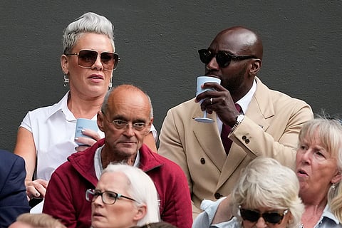Pink watches semifinal match between Djokovic and Musetti